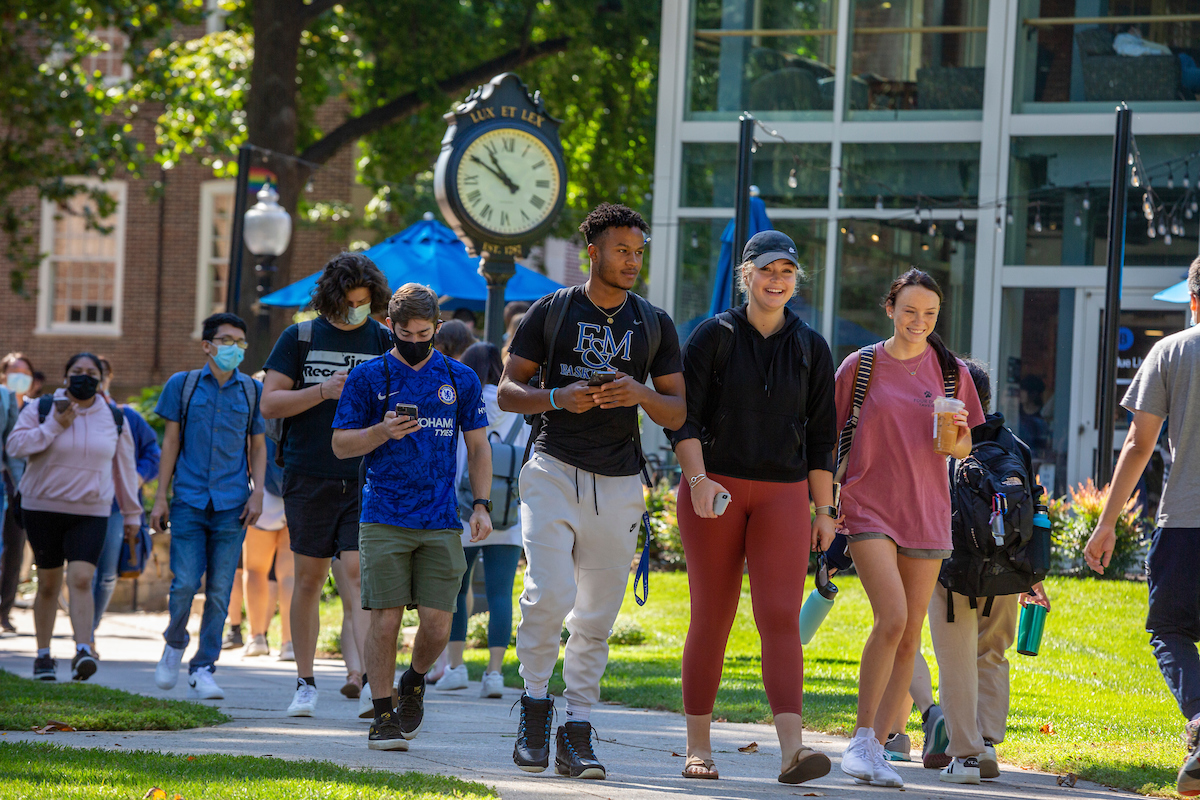 Students walk across campus to and from class.